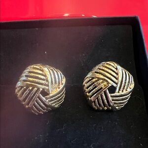 Gold tone button knot style earrings, pierced